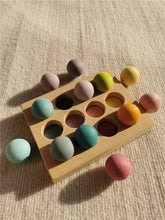Load image into Gallery viewer, Pastel wooden balls in a sorting board